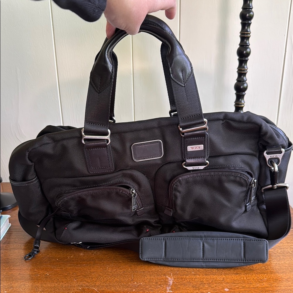Tumi Black carry on with Durable Design